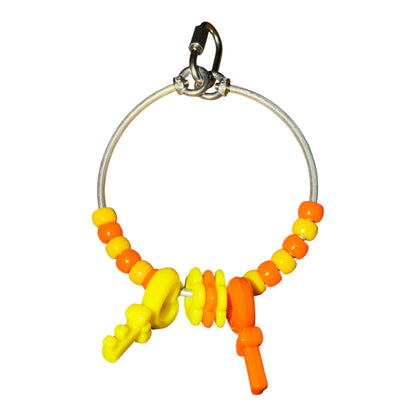 FensieVogels Power Ring parkieten – RVS & Acryl Geel/oranje